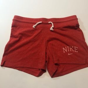 Red Nike shorts size small